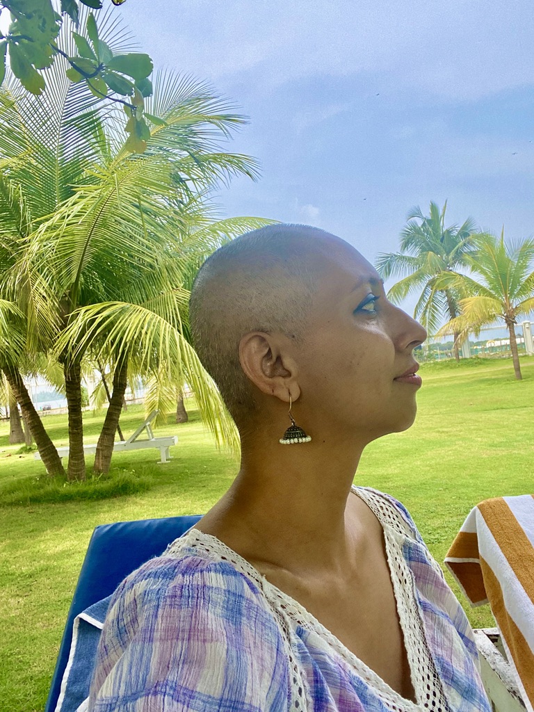 Bald girl- Head shaved- Tropical view